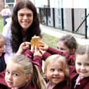 Lauren Steadman with her gold medal and pupils from the prep school