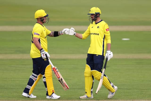 Ben McDermott, left, and James Vince  fist pump during their record stand against Sussex last night. Photo by Warren Little/Getty Images