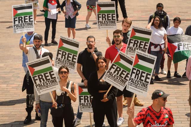 Pictured is: Showing their solidarity.
Picture: Keith Woodland (120621-51)