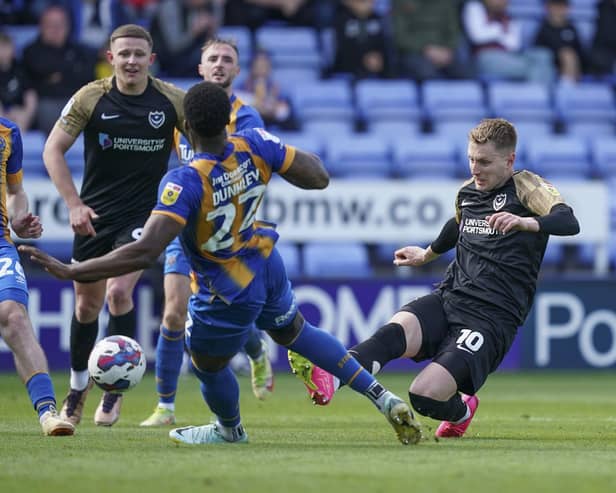 Joe Pigott fires in a first-half shot on his return to John Mousinho's line up at Shrewsbury. Picture: Jason Brown/ProSportsImages