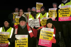 Members of Portsmouth Stand up to Racism group during a protest at Southsea beach