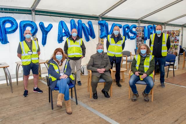 1 year anniversary of vaccines at St James Hospital, Portsmouth on Tuesday 1 February 2022
Pictured: Volunteers Norman Matthew, Ron Hobden, John Hargreaves, Barry Gould, Alexandra Sard, Albie Somerset and Brett Rumfitt at St James Hospital vaccine centre
Picture: Habibur Rahman