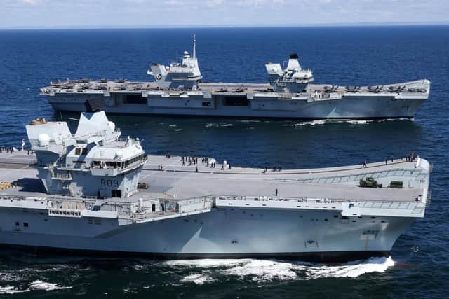 HMS Prince of Wales and HMS Queen Elizabeth pictured at sea for the first time. Photo: Royal Navy