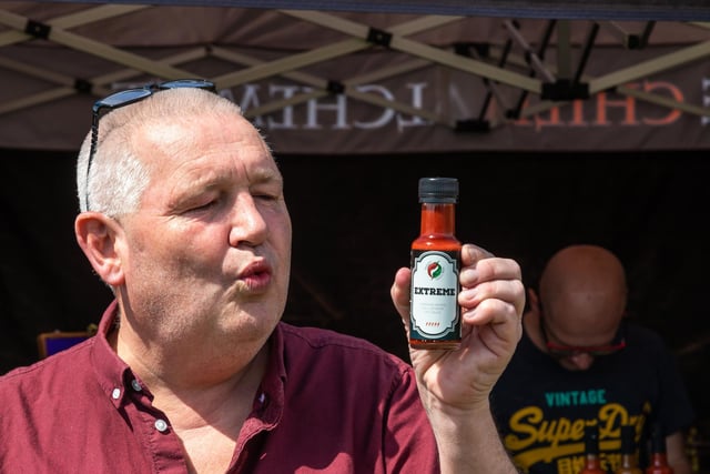 A moment of regret from Phil Martin after sampling the Extreme Chilli Sauce from the Dorset Chilli Shop from Bournemouth. Picture: Mike Cooter (210522)