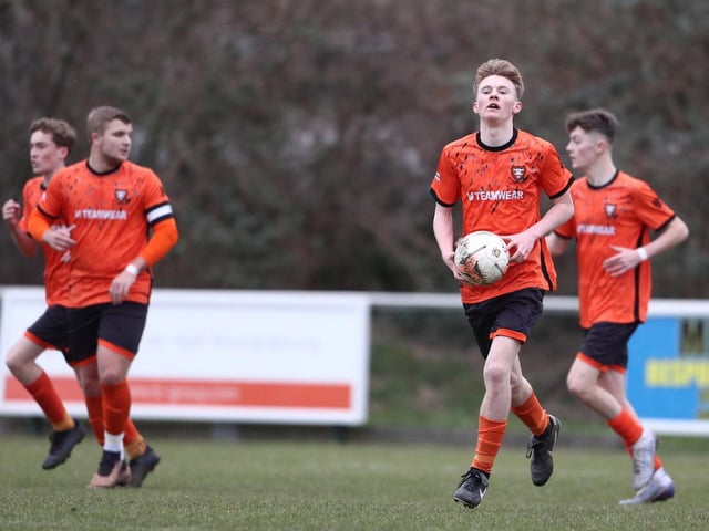 Portchester (orange) have just scored their first goal. Picture: Stuart Martin