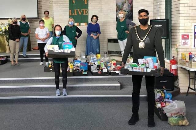Prad Bains with other volunteers at Waterlooville Food Bank.