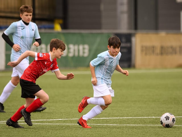 Action from the Portsmouth Youth League Geldard Invitation Cup final between Jubilee 77 U13s and Castle United U13s (light blue and white kit). Picture: Keith Woodland (190321-552)