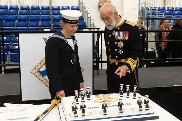 Recruit Katie Stocks cuts the cake with Prince Michael of Kent
Picture: Keith Woodland (231021-200)