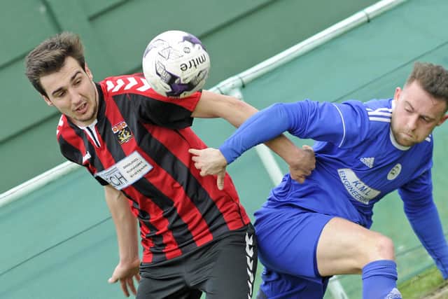 Curt Robbin, left, netted Fareham's second goal at Amesbury. Picture: Ian Hargreaves