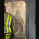 Crew tackling a firefighting training exercise onboard HMS Queen Elizabeth.