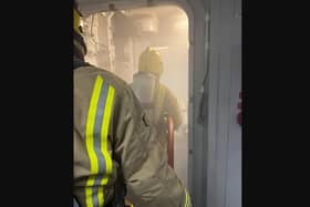 Crew tackling a firefighting training exercise onboard HMS Queen Elizabeth.