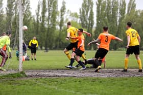 Action from the City of Portsmouth Sunday League Division 6 meeting between Fratton Trades (orange) and FC Fenix. Picture: Chris Moorhouse (jpns 160521-)