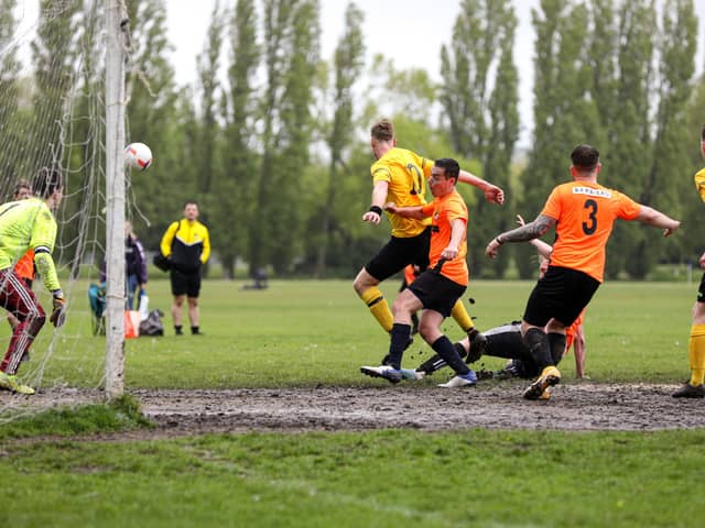 Action from the City of Portsmouth Sunday League Division 6 meeting between Fratton Trades (orange) and FC Fenix. Picture: Chris Moorhouse (jpns 160521-)
