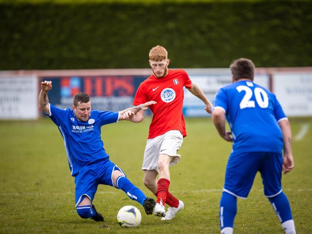 Action from Gosport Town's 4-0 victory over Lee Rangers (blue kit) in the Portsmouth & District FA Trophy final at Cams Alders. Picture: Alex Shute