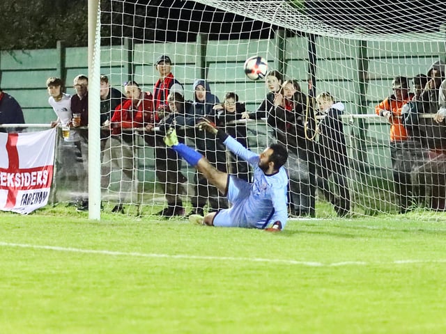 Fleetlands keeper Ollie Carroll is beaten in the shoot-out. Picture by Ken Walker