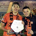 Josh Flint with former Pompey team-mate Leon Maloney (right) after securing promotion to the Eredivisie in April 2022, following a 2-1 triumph over Den Bosch.