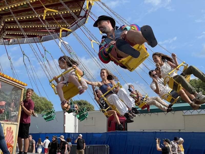 People enjoy a fairground ride at the Victorious Festival in Southsea, Hampshire. Picture date: Friday August 25, 2023. Pic: Ben Mitchell/PA Wire