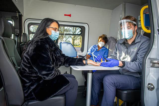 Farlington-based healthcare logistics company, Future Healthcare, has teamed up with an Oxfordshire based biotech company providing mobile Covid-19 testing throughout the UK at Vision,  Walton Road, Portsmouth.The two firms are offering antibody tests to people at  Railway Triangle on 24 November 2020.Pictured:   Former reporter Hope Mckellar having her test done by Product Specialist, Scott Walkden at the mobile test centre.Picture: Habibur Rahman