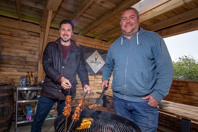 The News reporter, Richard Lemmer with Elky Whittaker at his barbecue shack in his garden. Picture: Habibur Rahman