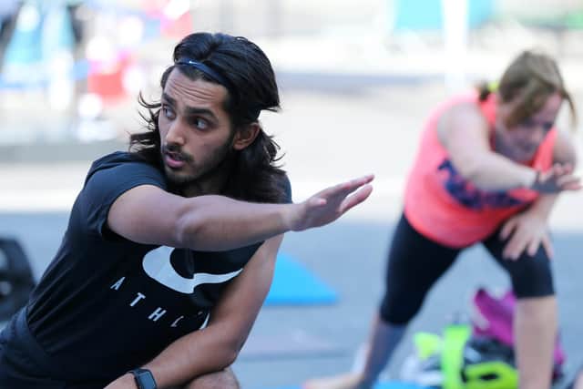 Stretch class. Sweat Fitness Festival, Gunwharf Quays. Picture: Chris Moorhouse (jpns 180921-27)