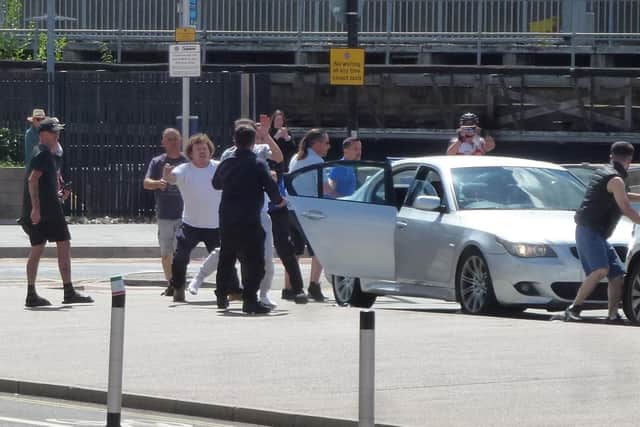 People from two vehicles allegedly began fighting during a brawl at The Hard Interchange.