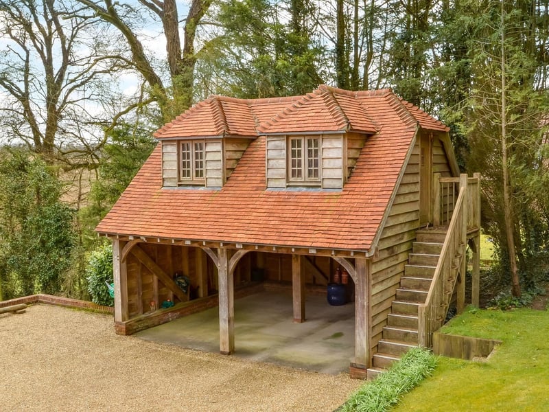 This four bedroom detached house in Hambledon is on sale for £1,895,000. It is listed by Fine and Country