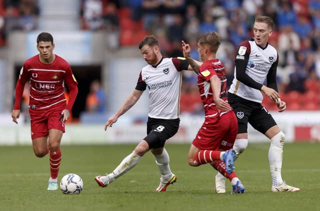 Ryan Tunnicliffe in action during today's game against Doncaster Rovers at the Keepmoat Stadium. Picture:Daniel Chesterton/phcimages.com