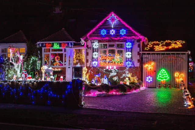 Barbara and Bill Wright have decorated their home with Christmas lights once again despite the cost of living crises to raise money for charity
Pictured: GV of the Christmas lights at their home in Portchester, Portsmouth on Monday 12th December 2022
Picture: Habibur Rahman
