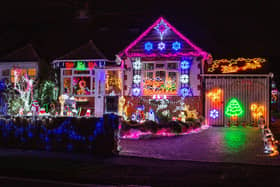 Barbara and Bill Wright have decorated their home with Christmas lights once again despite the cost of living crises to raise money for charity Pictured: GV of the Christmas lights at their home in Portchester, Portsmouth on Monday 12th December 2022Picture: Habibur Rahman