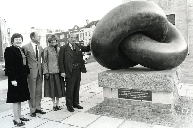 Sir Peter and Lady Gasden (right) with Mr Brian Wall, Portsmouth director of Tourist and Leisure and Portsmouth press office Jane Robinson at the Bands of Friendship Memorial, Old Portsmouth, 1985. The News PP5536