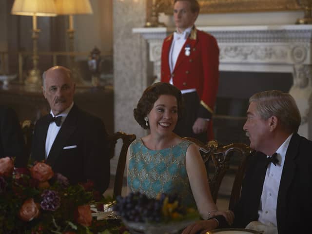 Olivia Colman, as The Queen, pictured in the State Dining Room at Belvoir Castle during filming of Netflix series The CrownPHOTO Des Willie / Netflix