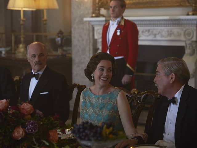 Olivia Colman, as The Queen, pictured in the State Dining Room at Belvoir Castle during filming of Netflix series The Crown
PHOTO Des Willie / Netflix