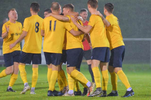 Underdogs Downton celebrate a goal at Cams Alders. Picture: Martyn White