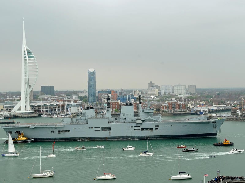 HMS Ark Royal leaves Portsmouth Harbour for its very last time - sadly under-tow! 20th May 2013. Picture: Malcolm Wells 131356-4833
