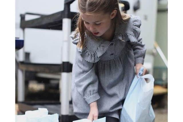 Kensington Palace has released new photos of Princess Charlotte, who celebrates her fifth birthday today, taken in April by her mother, the Duchess of Cambridge, on the Sandringham Estate, where the family helped to pack up and deliver food packages for isolated pensioners in the local area. Photo: The Duchess of Cambridge