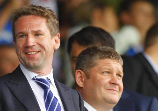 Vladimir Antonov (left) and Roman Dubov took over Pompey in June 2011. Antonov is currently in prison for bank fraud. Picture: Chris Ison