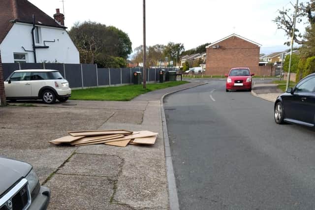 The driver of this waste removal truck decided to unload wood from his truck and leave it piled at the side of the road to make way for a more valuable load in Gosport. Picture: Gosport Borough Council