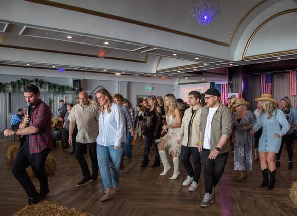 Funky Sole Line Dancing Club puts Country on the Coast festival-goers through their paces at The Gaiety on South Parade Pier from April 21-23, 2023. Picture by Emma Terracciano