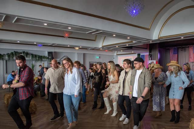 Funky Sole Line Dancing Club puts Country on the Coast festival-goers through their paces at The Gaiety on South Parade Pier from April 21-23, 2023. Picture by Emma Terracciano