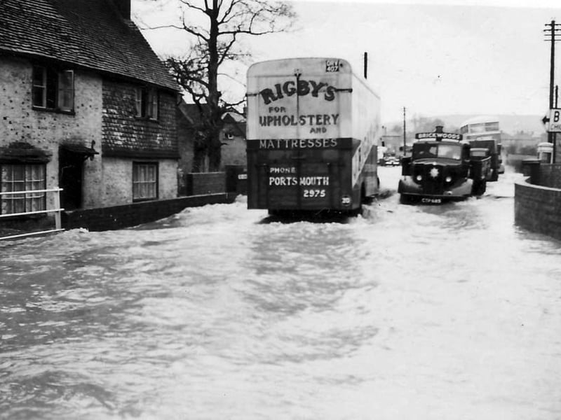 Flooding at the Forebridge crossroads at the lower end of The causeway, Petersfield 1931.
The photos were taken by the late Leslie Kinshott.
Joce and David Allen tell us: I was working at the High Street in 1954 and lodging at The Good Intent pub. I remember at lunchtime one day when walking back along College Street, the water was so deep it was lapping over the tops of my wellington boots I was wearing at the time.
Picture: Leslie Kinshott courtesy of Joce and David Allen, Petersfield