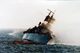 HMS Coventry - pictured 10 minutes after being struck by Argentine forces - which was sunk during the Falklands Conflict