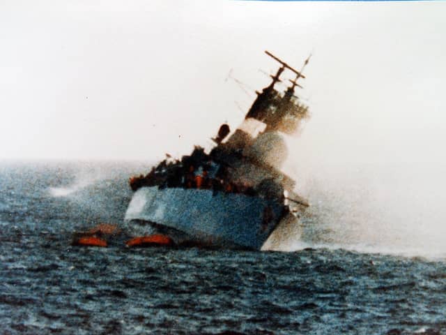 HMS Coventry - pictured 10 minutes after being struck by Argentine forces - which was sunk during the Falklands Conflict