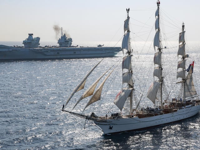 RNOV Shabab Oman II and HMS Queen Elizabeth in the Arabian Sea in October 2021