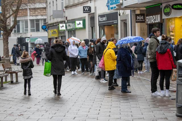 Pictured: Shoppers queue in Commercial Road during Covid-19 pandemic restrictions.

Picture: Habibur Rahman