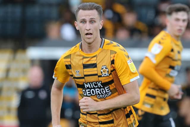 Pompey academy graduate Adam May has extended his stay with Cambridge United.