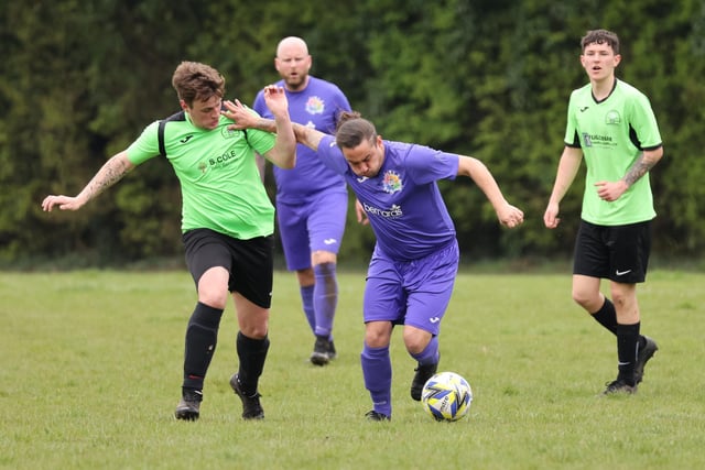 Action from the City of Portsmouth Sunday League Division Four match between AFC Bedhampton Village reserves and Friends Fighting Cancer (purple kit). Picture: Kevin Shipp