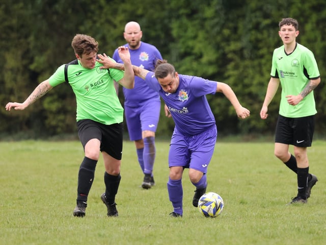 Action from the City of Portsmouth Sunday League Division Four match between AFC Bedhampton Village reserves and Friends Fighting Cancer (purple kit). Picture: Kevin Shipp
