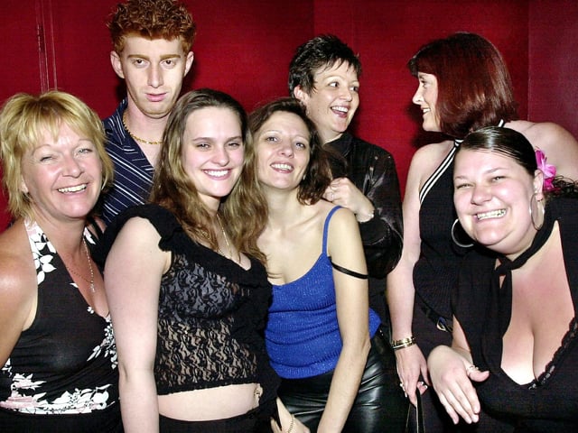 Clubbers having a good time at Buddies 25+ nightclub at The Pyramids, Clarence Esplanade, Southsea, in the 00s.