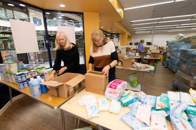 Stella s Voice Charity call for space as they become overwhelmed with aid for Ukraine on Thursday 10th March 2022Pictured: Jayne McLoughlin and Julie Edwards sorting the donations at the Merdian Centre, Havant on Thursday 10th March 2022Picture: Habibur Rahman