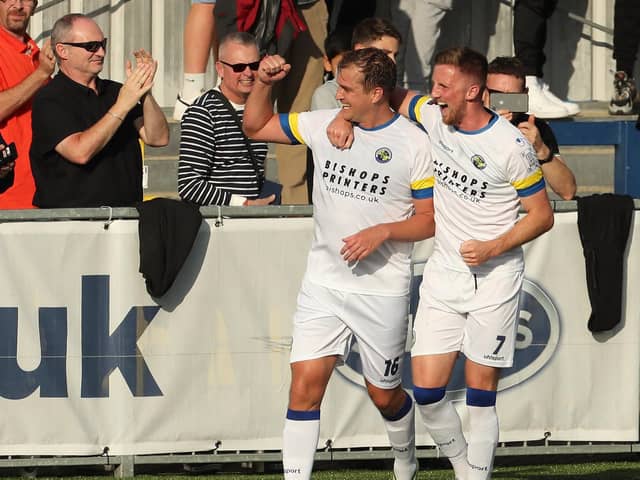 Defender Jamie Collins, left, celebrates with Jake McCarthy after scoring from the penalty spot. Picture: Dave Haines